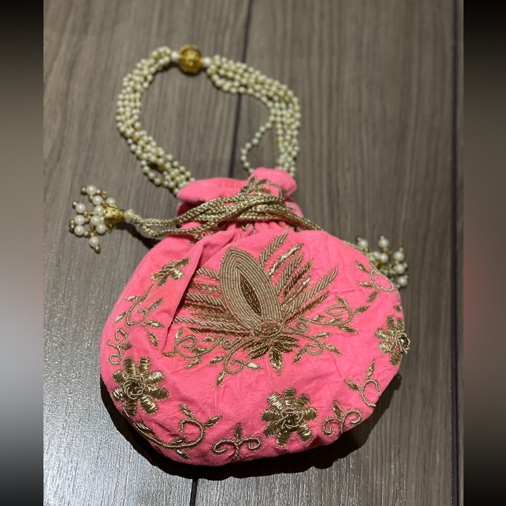 Pink and gold embroidered velvet clutch bag